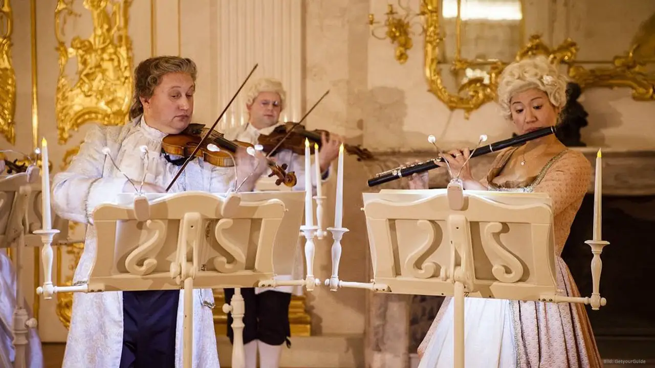 Solists in baroque clothing at a residence concert in Charlottenburg Palace Berlin